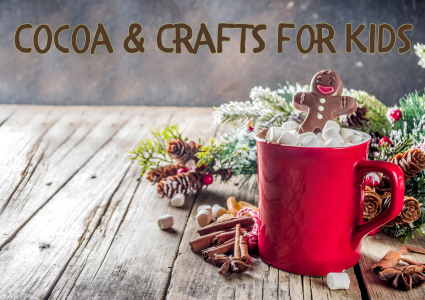 Red mug with cocoa and seasonal decor